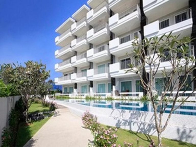 Modern, spacious condo for sale by the sea with balcony, pool and other amenities